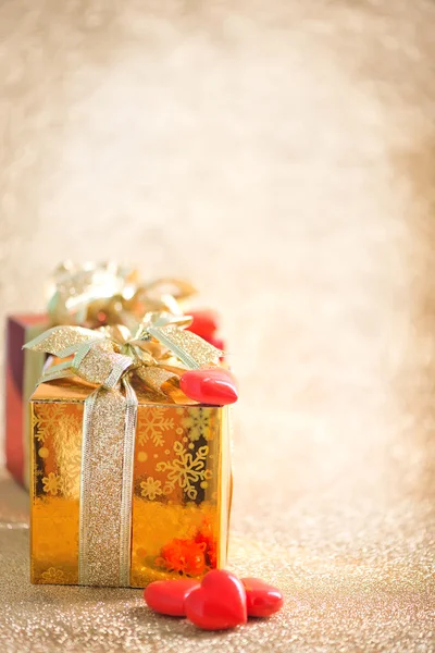 Presents with golden ribbons — Stock Photo, Image