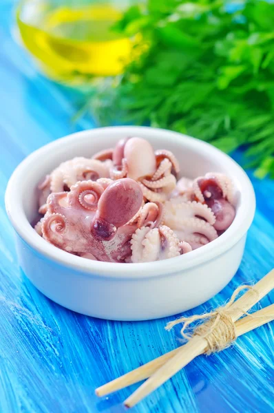 Boiled octopuses in bowl — Stock Photo, Image