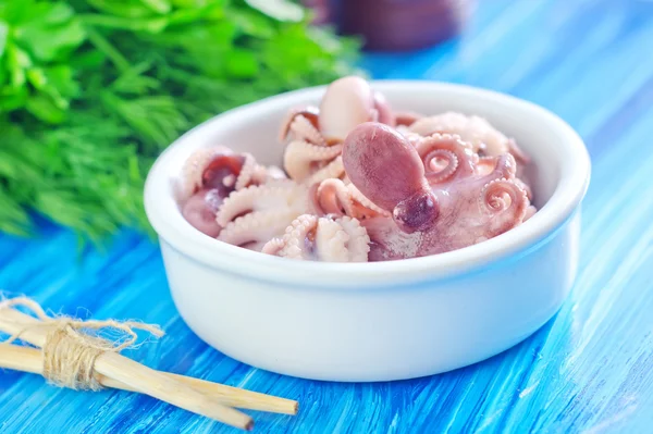 Boiled octopuses in bowl — Stock Photo, Image