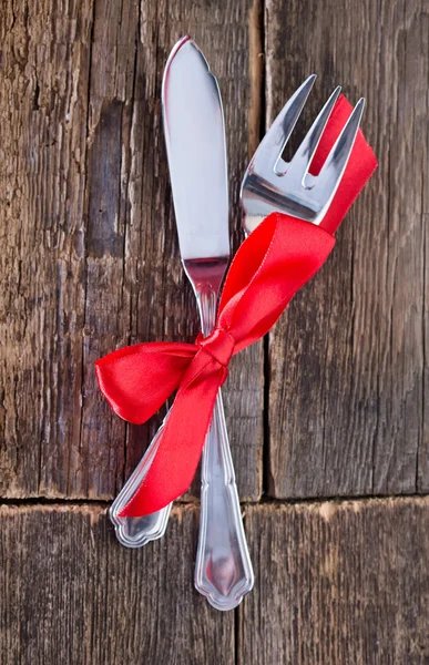 Fork and knife with ribbon Stock Image