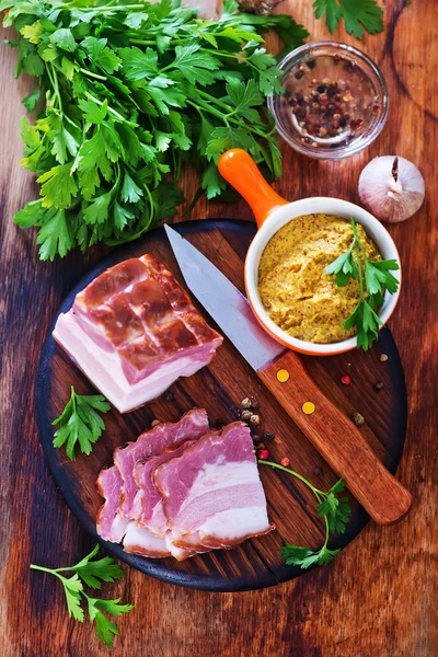 Smoked lard with parsley — Stock Image Smoked lard with parsley Royalty Free Stock Photos