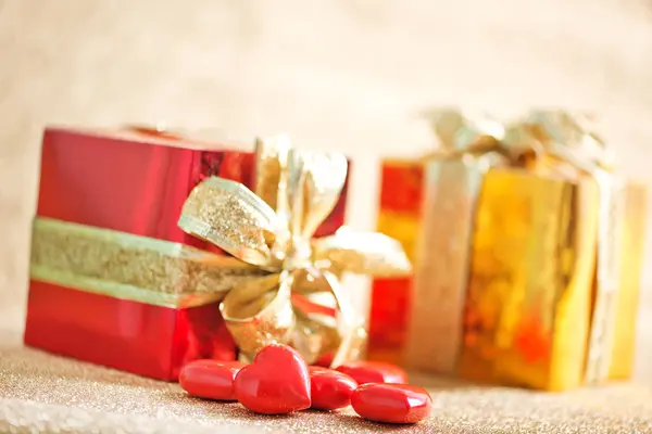 Presents with golden ribbons — Stock Photo, Image