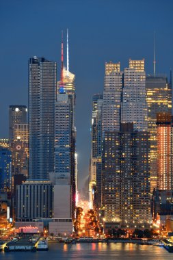 Manhattan midtown skyline at night clipart
