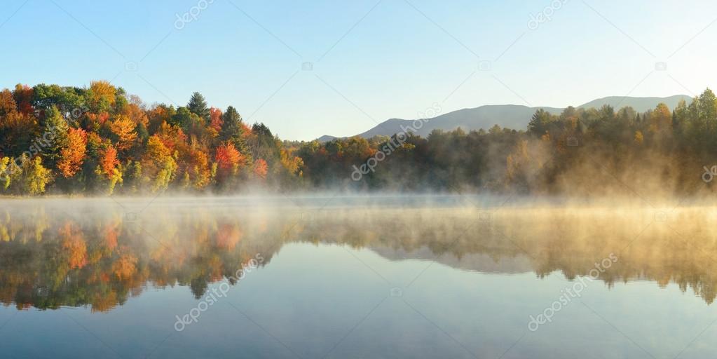 Fog over autumn lake