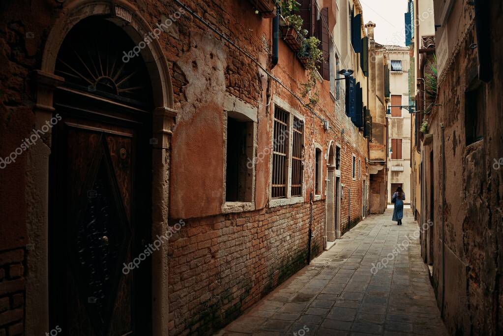 Фотообои Alley view with historical buildings in Venice, Italy.