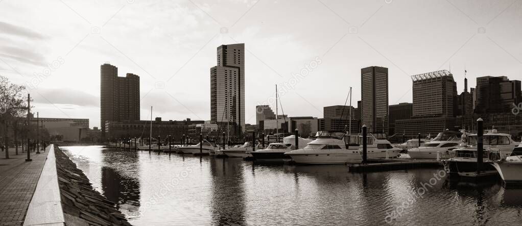 Baltimore inner harbor district view with urban buildings.