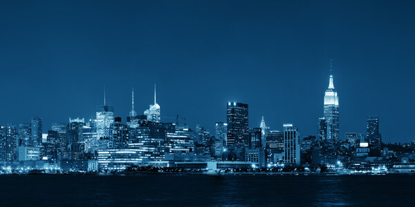 Midtown Manhattan skyline black and white at dusk panorama over Hudson River