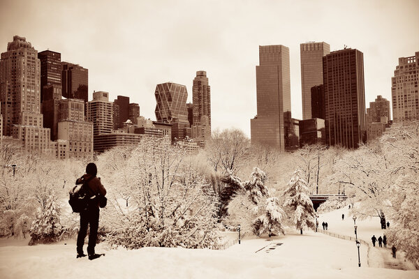 A tourist watching Central Park in midtown Manhattan New York City