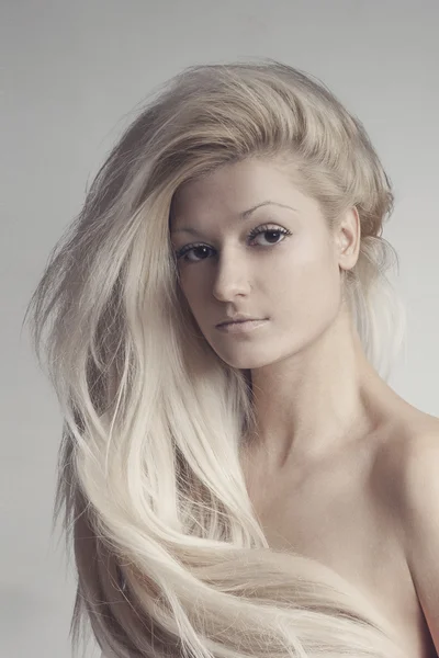 Close-up portrait of beautiful model with long blond hair — Stock Photo, Image