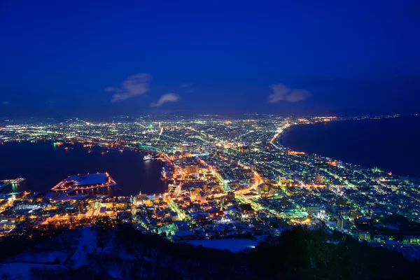 Byen Hakodate i tusmørket - Stock-foto