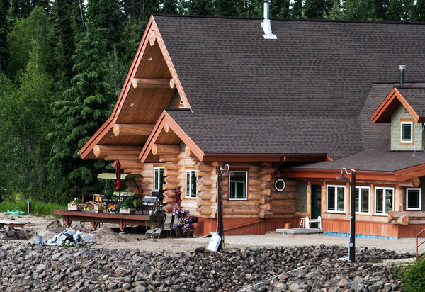 Log Home on a river shore