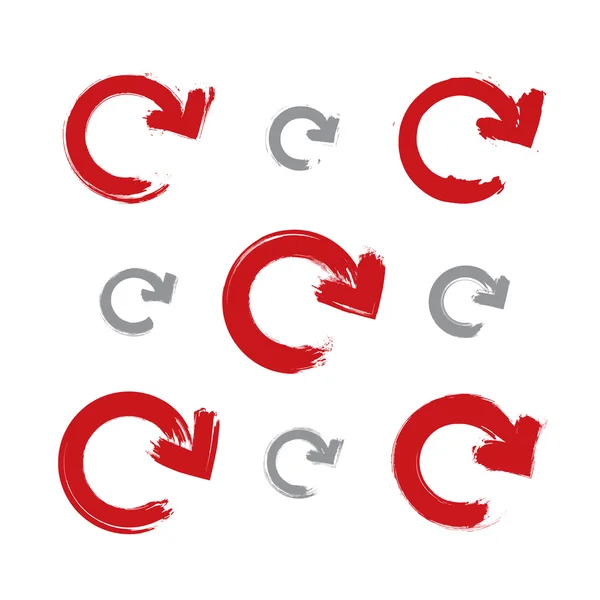 Набор вручную окрашенных красных знаков обновления, изолированных на белой backgroun — стоковый вектор