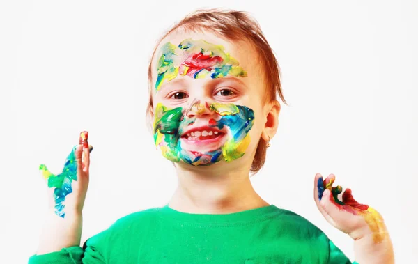 Happy cute little girl with colorful painted hands — Stock Photo, Image