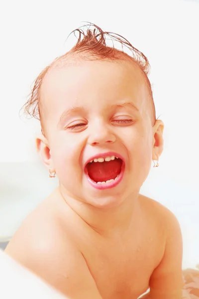 Happy baby girl in a bathtub — Stock Photo, Image