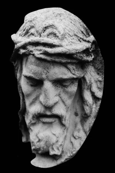 Very ancient partially broken stone statue of Jesus Christ crown of thorns.