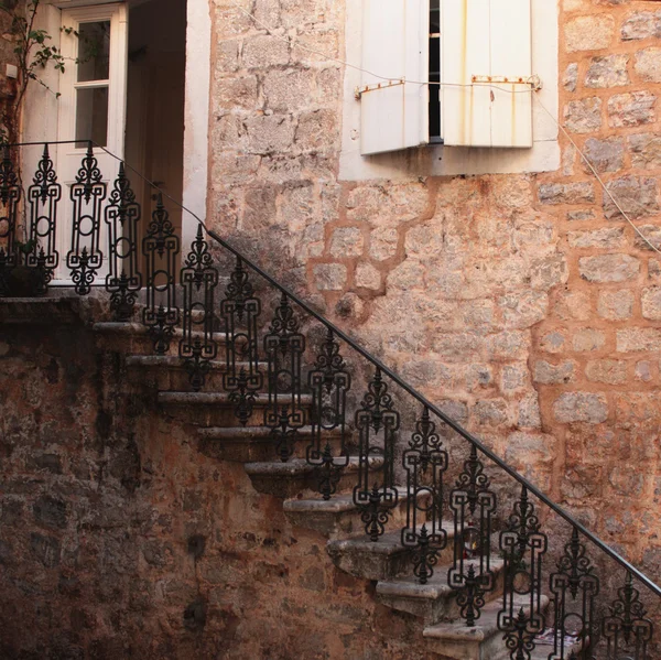 Abstract of a Brown stone wall with window and stairs — Stock Photo, Image