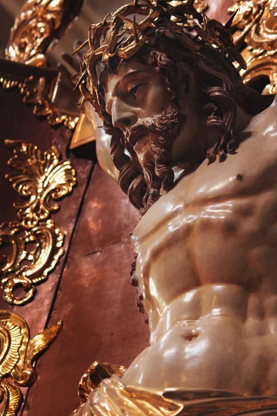 Crucified Jesus Christ statue (fragment. Baroque style) — Stock Photo, Image