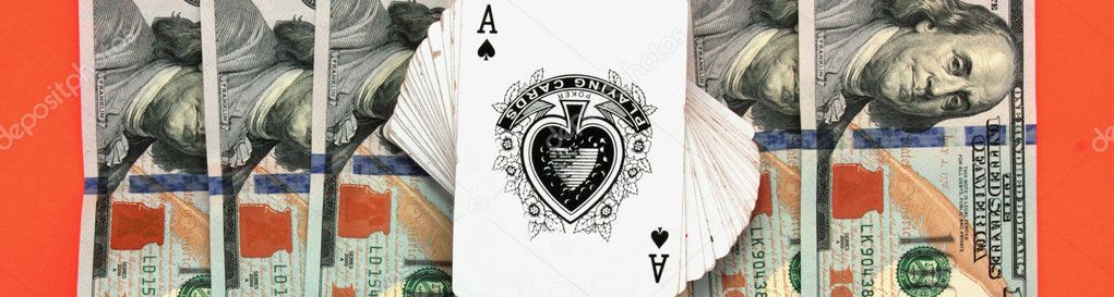 cards and money as a symbol of gambling in casino
