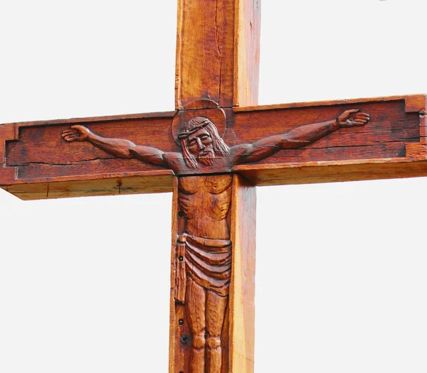 Fragment of statue of crucified Jesus Christ  (an ancient wooden — Stock Photo, Image