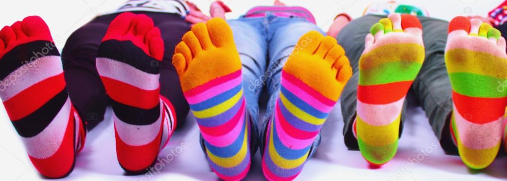 happy young people express their love of life through the cheerful colors of socks