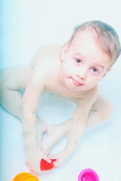 Baby girl in a bathtub — Stock Photo, Image