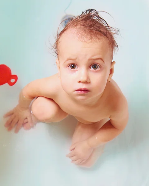 Baby girl in a bathtub — Stock Photo, Image