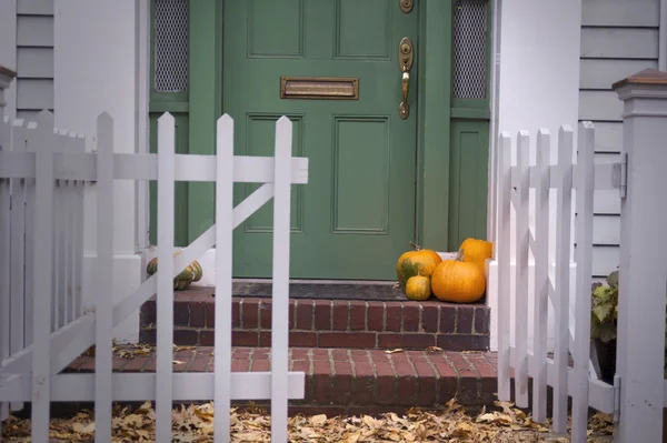 Pumpkins on porch — Stock Photo, Image