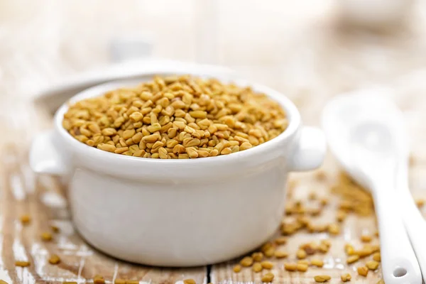 Fenugreek seeds in a bowl — Stock Photo, Image