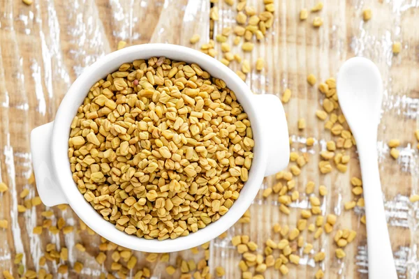 Fenugreek seeds in a bowl — Stock Photo, Image