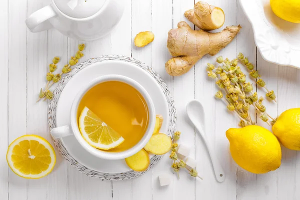 Tea with lemon, ginger and herbs — Stock Photo, Image