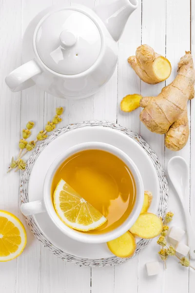 Tea with lemon, ginger and herbs — Stock Photo, Image