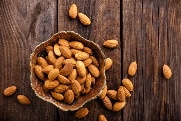 Almond nuts in a bowl — Stock Photo, Image