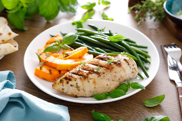 Grilled chicken breast with green beans and butternut squash
