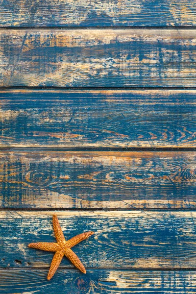 Fondo de madera con estrellas de mar — Foto de Stock