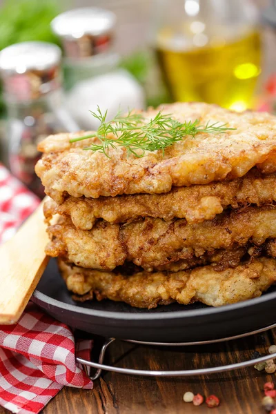 Pork chops in egg — Stock Photo, Image