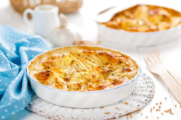 Potato gratin on a table — Stock Photo, Image