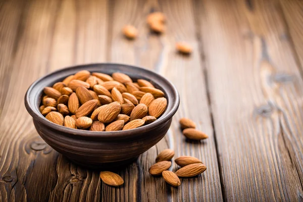 Almond nuts in a bowl — Stock Photo, Image