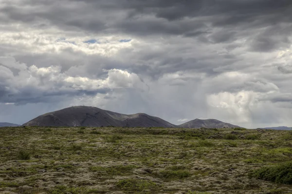 Mountain and rain clouds — Stock Photo, Image