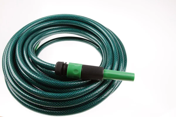 Coiled garden hose — Stock Photo, Image