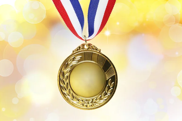 Gold medal on ribbon — Stock Photo, Image