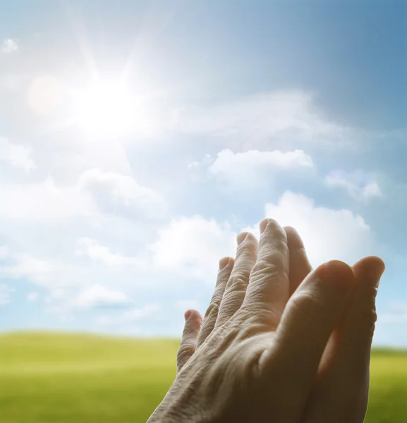 Prayer hands and sky — Stock Photo, Image