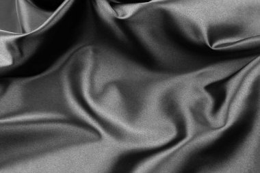Dalgalanan siyah ipek kumaşın yakınlaştırılması