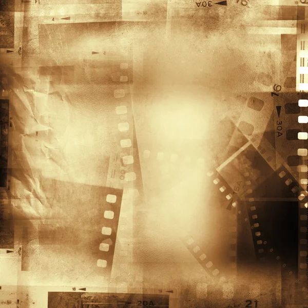 Film negative frames brown background. Copy space
