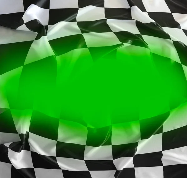 Checkered black and white flag on green background