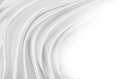 Dalgalanan beyaz ipek kumaş çizgilerinin yakınlaştırılması