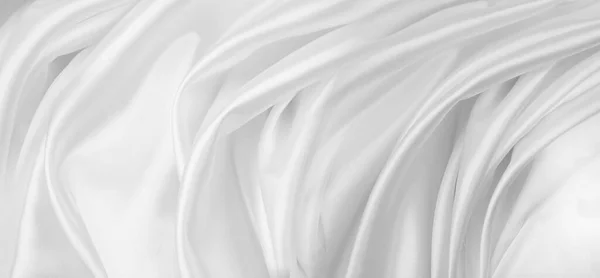 Nahaufnahme Von Wellenförmigen Weißen Seidenstofflinien — Stockfoto