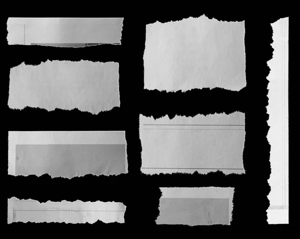 黒を基調とした8枚の破れた新聞 — ストック写真