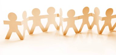 Kağıt zincir takımı el ele tutuşuyor. Takım çalışması. Ortaklık