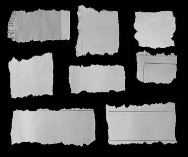 Siyah arka planda sekiz parça yırtık gazete