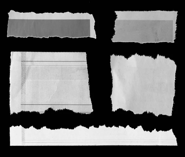 Five Pieces Torn Newspaper Black Background — Stock Photo, Image